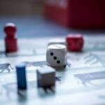 Mastering Languages Through Gambling Strategies